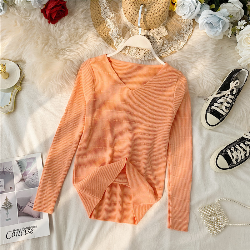 Női pulóver sima modell spitz nyakkivágással, különböző színekben