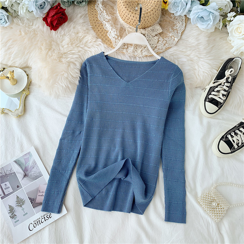 Női pulóver sima modell spitz nyakkivágással, különböző színekben