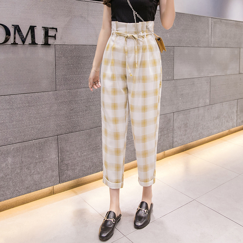 Pantaloni de damă actuali în carouri în trei culori