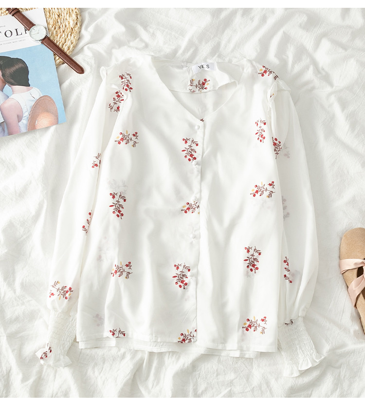 Cămașă actuală de damă în alb-negru cu decolteu în V