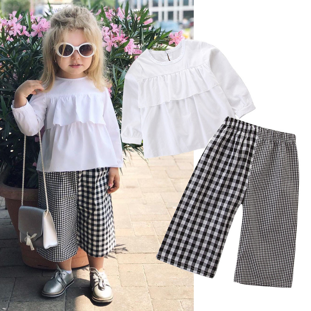 Модерен детски комплект за момичета блуза в бял цвят + кариран панталон