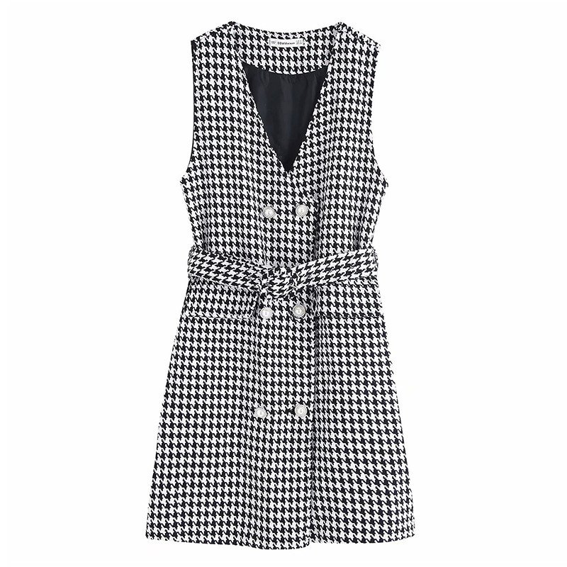 Női ruha V-alakú gallérral, fekete-fehér színben