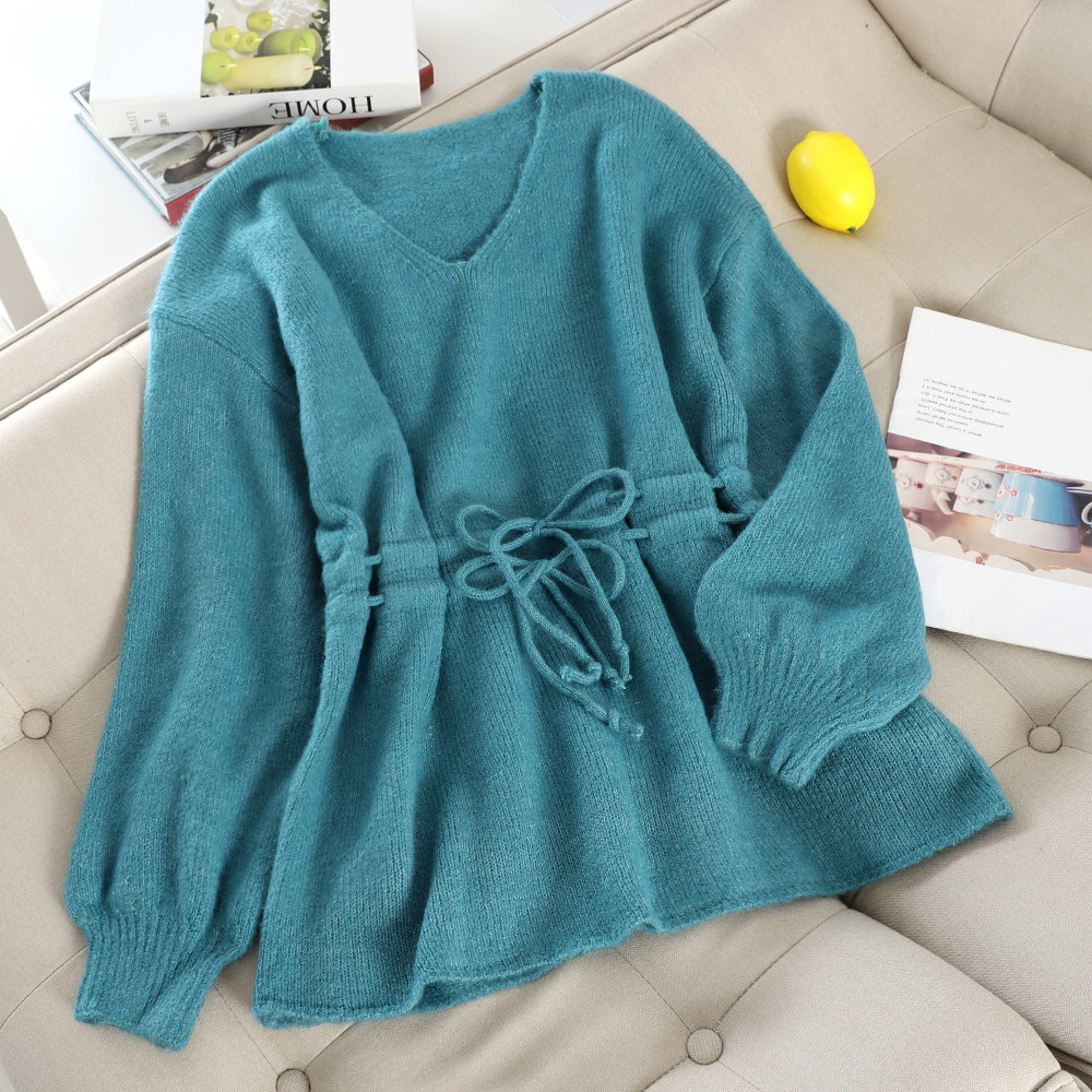 Modern női pulóver derékkötővel több színben