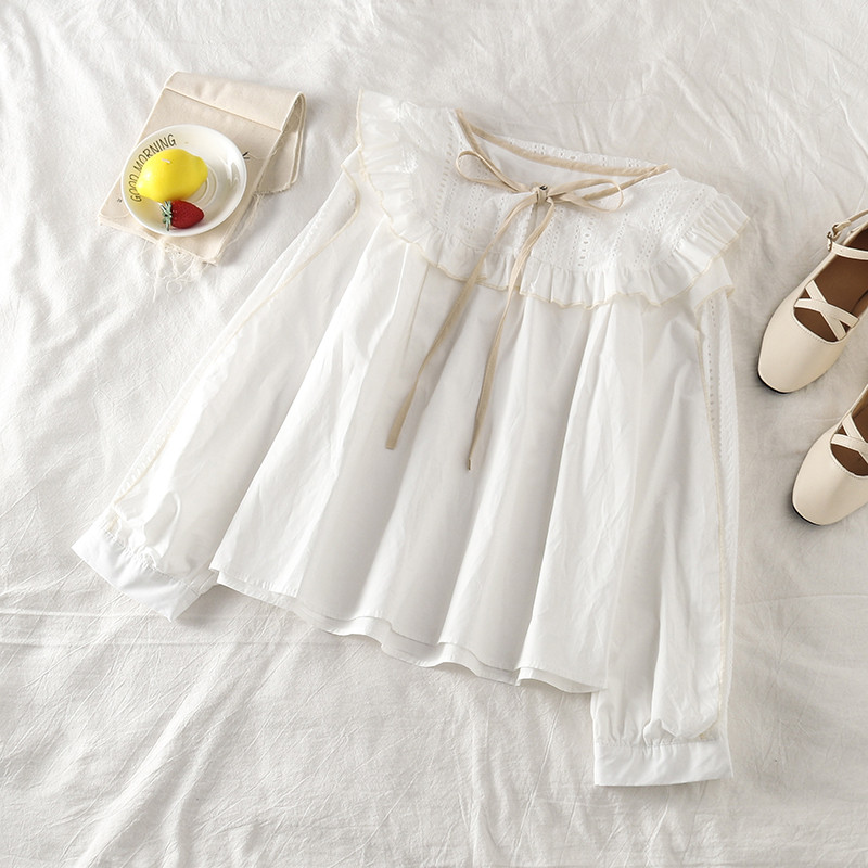 Bluză de damă modernă cu cravate în alb și albastru