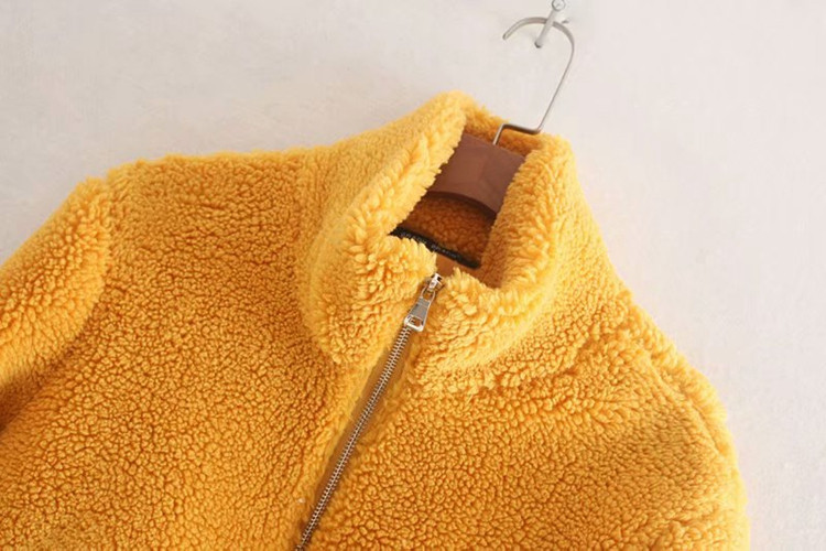 Rövid szűk kabát cipzárral és zsebekkel több színben