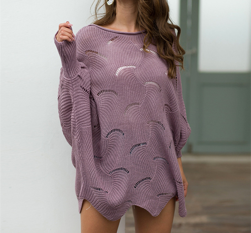 Μοντέρνο γυναικείο πουλόβερ  με φαρδιά μανίκια και λαιμόκοψη