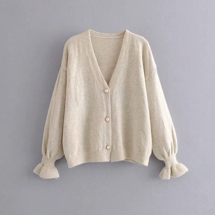 Σύντομη γυναικεία ζακέτα με κουμπιά και πέρλες σε τρία χρώματα