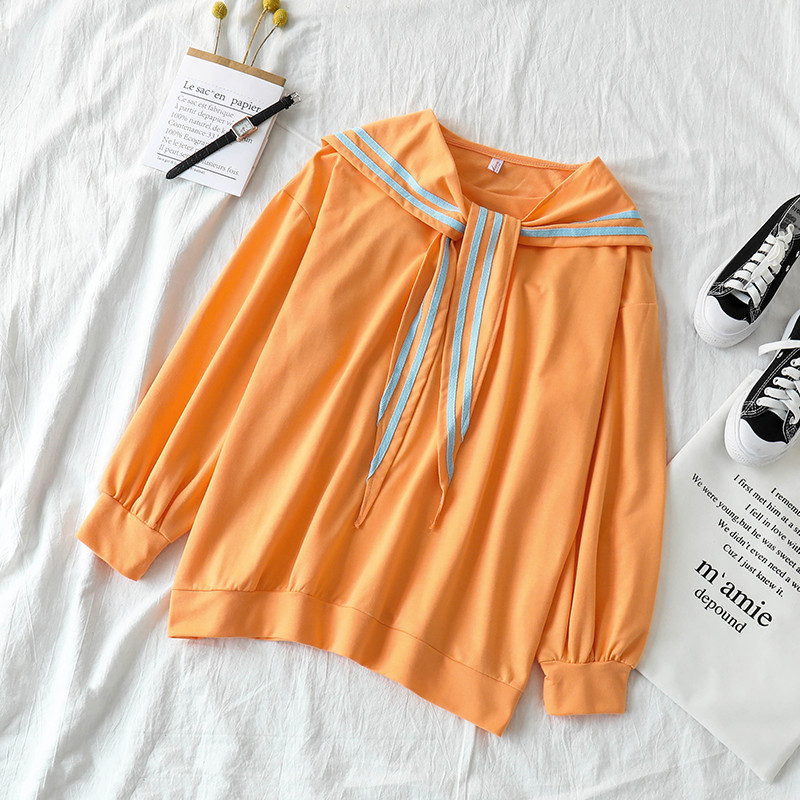 Női blúz fehér és narancs színben