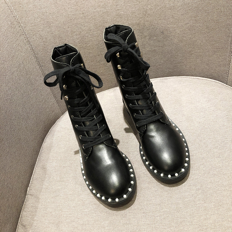 Κορυφαίες γυναικείες μποτάκια άρβυλα σε μαύρο χρώμα - δύο μοντέλα