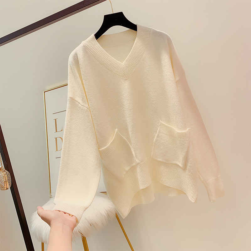 Női pulóver zsebbel és spitz nyakkivágással több színben