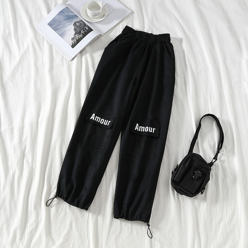 Női alkalmi nadrág fekete felirattal