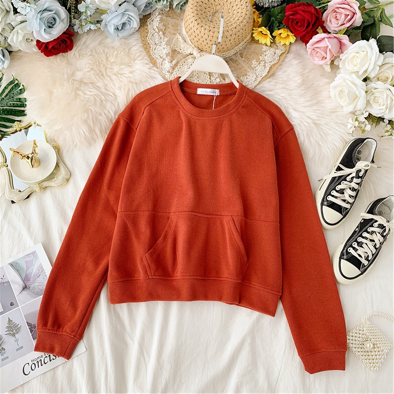 Μοντέρνο γυναικείο πουλόβερσε τέσσερα χρώματα με τσέπη και ωοειδές λαιμόκοψη