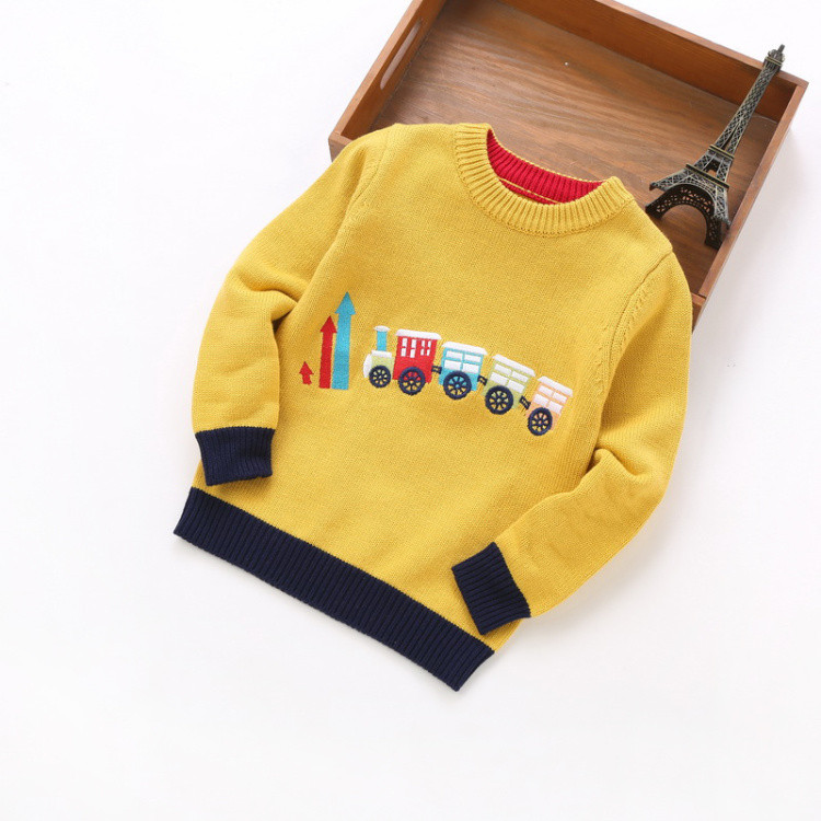 New model of children`s sweater with embroidery in several colors for boys