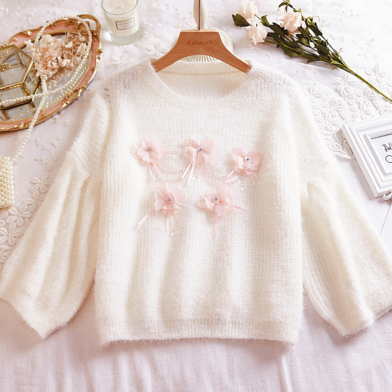 Γυναικείο πουλόβερ με τρισδιάστατο στοιχείο σε λευκό, κίτρινο και ροζ χρώμα