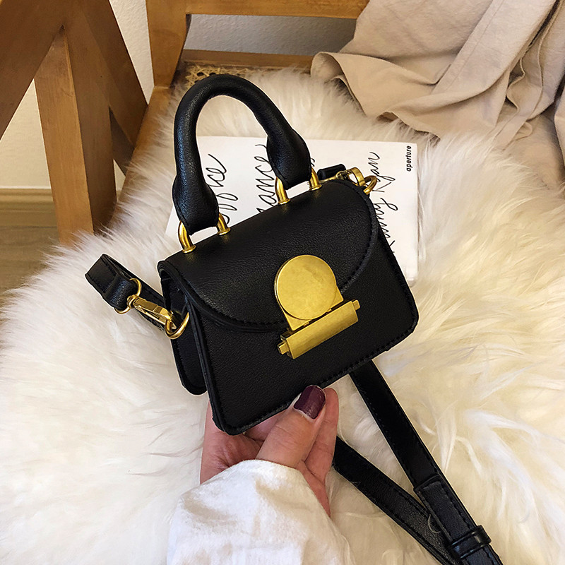 Geanta de dama mica cu inchidere metalica