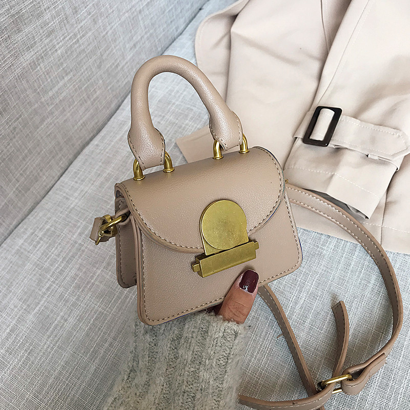 Geanta de dama mica cu inchidere metalica