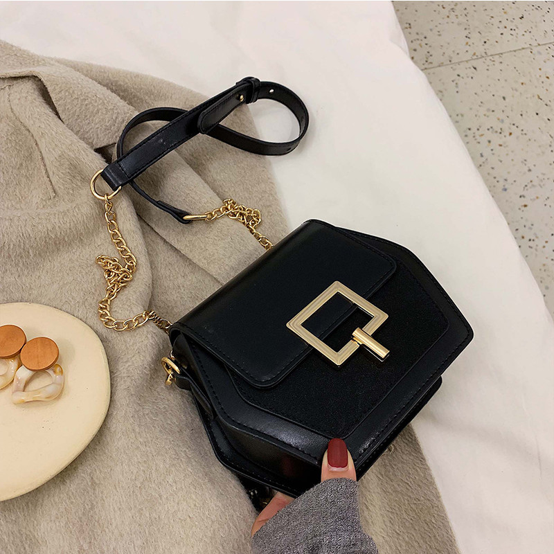 Női táska hosszú fém fogantyúval