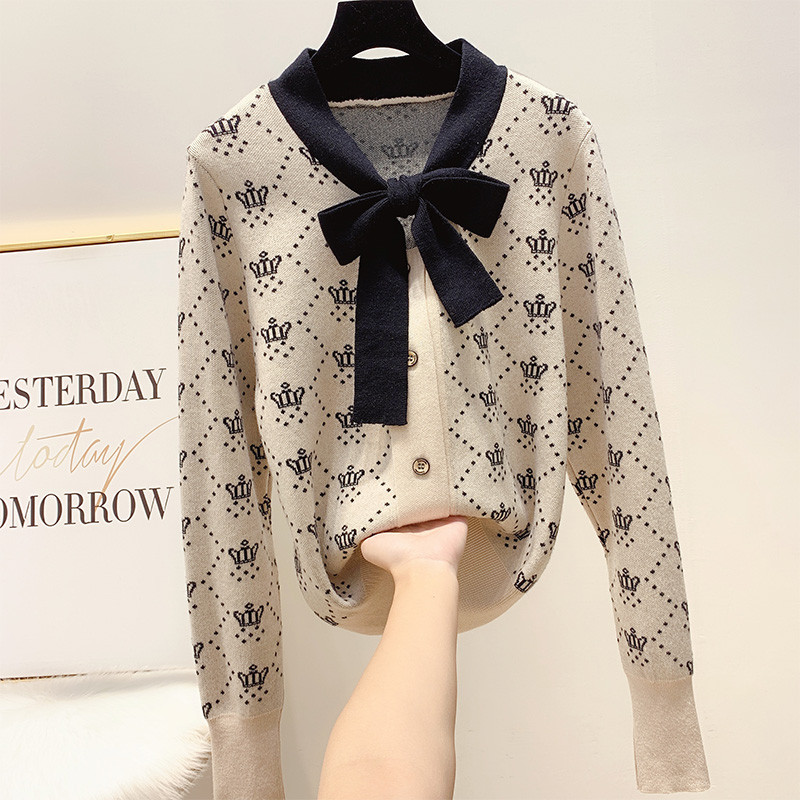 Modern női pulóver gombokkal, négy színben