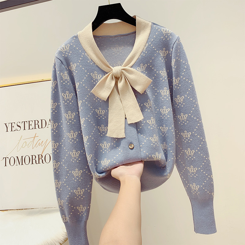 Modern női pulóver gombokkal, négy színben