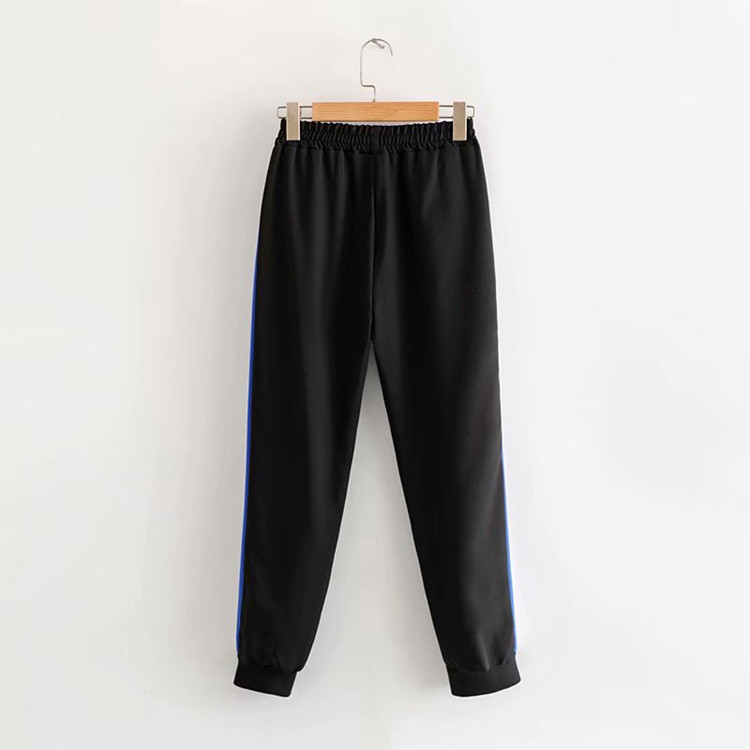 Női sportnadrág gumírozott derékkal és oldalsó szegéllyel