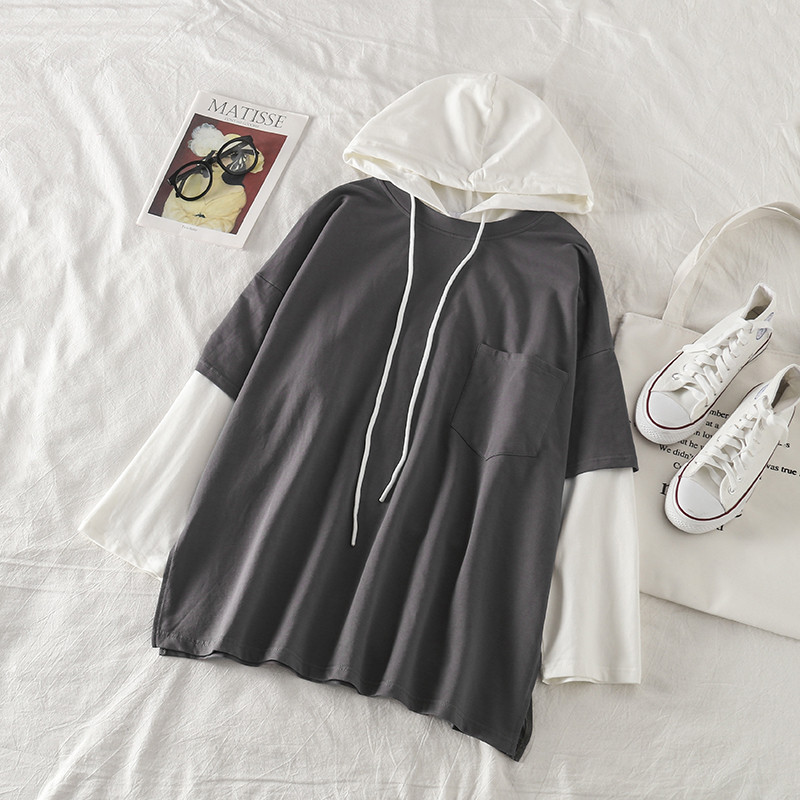 Női blúz kapucnival és zsebbel - széles modell