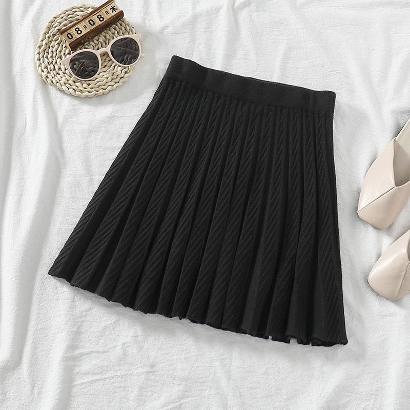 Női szoknya magas derékkal, fekete és bézs színben