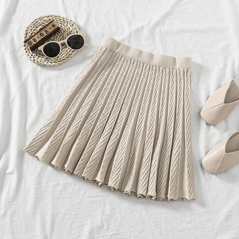 Női szoknya magas derékkal, fekete és bézs színben