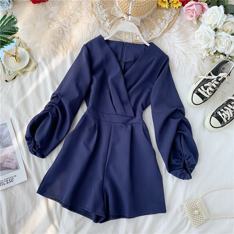 Salopetă de damă modernă cu mâneci lungi și decolteu spitz