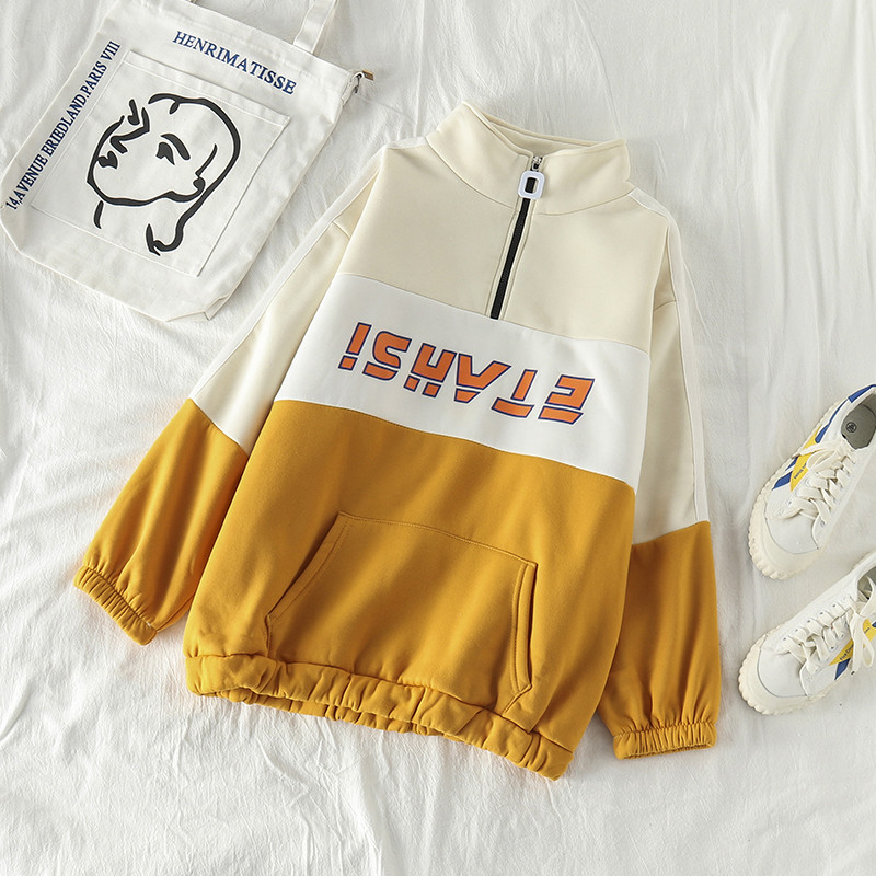 Modern női pulóver zsebbel, három színben