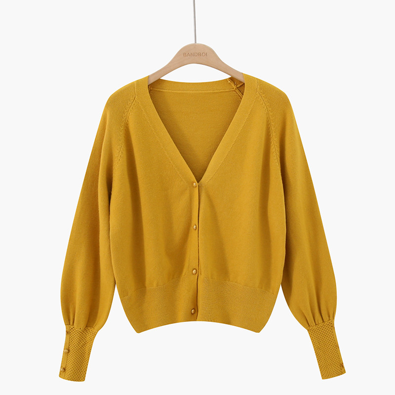 Aktuális női mellény gombokkal és spitz nyakkivágással több színben