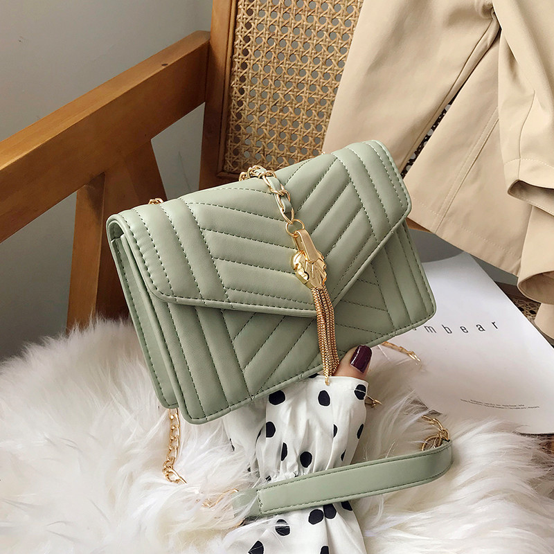 Geanta de dama eleganta cu element metalic in patru culori