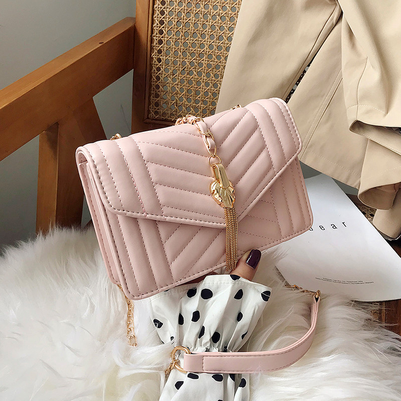 Geanta de dama eleganta cu element metalic in patru culori