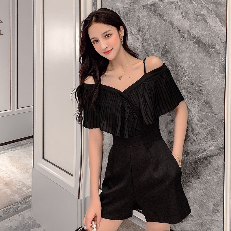 Stílusos női overall fekete-fehér színben