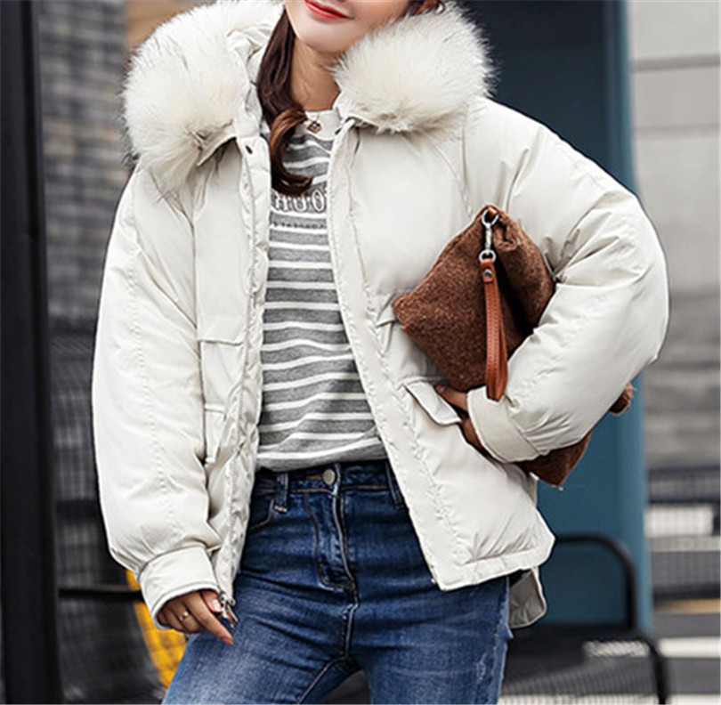 Γυναικείο χειμερινό φαρδύ μπουφάν με κουκούλα