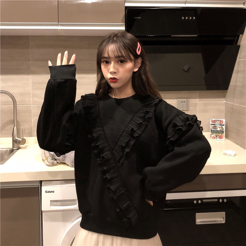 Γυναικεία casual μπλούζα σε μαύρο και άσπρο χρώμα - φαρδύ μοντέλο