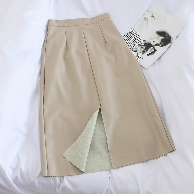 Modern női szoknya, magas derékkal, slicceléssel, öko bőrből