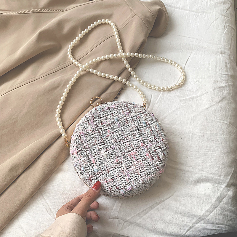 Geanta de dama moderna in doua culori cu perle