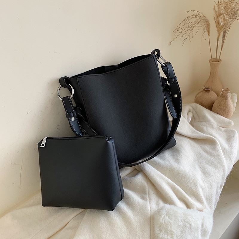 Geanta de dama moderna cu maner lung