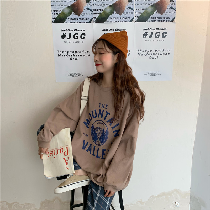 Széles női blúz barna és fehér színben