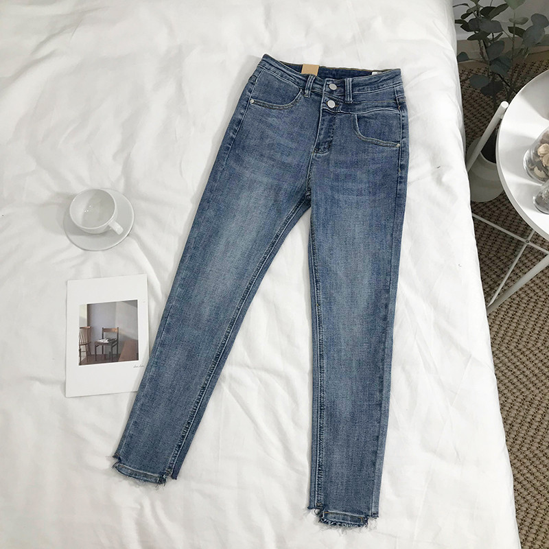 Alkalmi női farmer gombokkal, magas derékkal