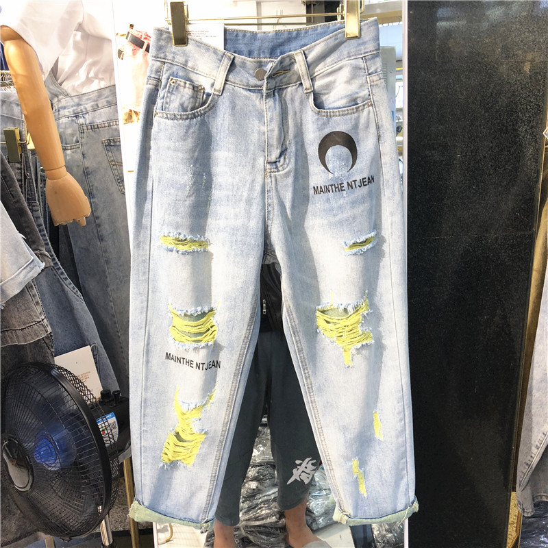 Blugi moderni de dama cu motive rupte si talie inalta