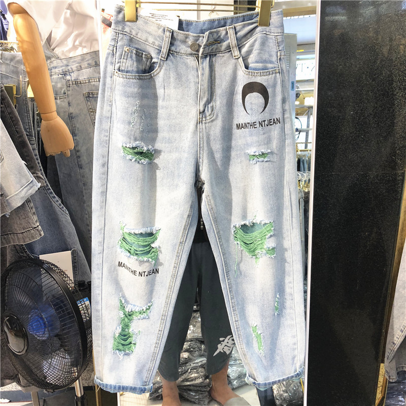 Blugi moderni de dama cu motive rupte si talie inalta