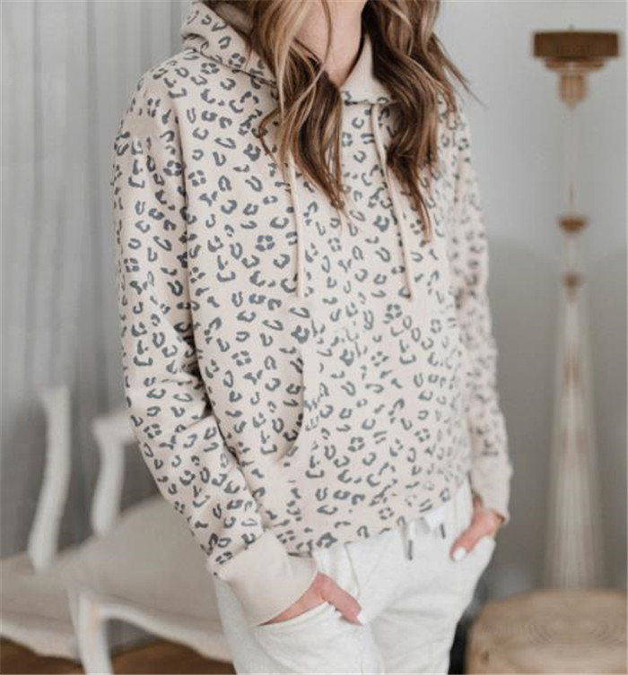 Modern női pulóver zsebbel és nyakkendővel, két színben