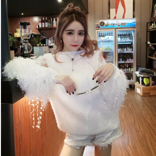 Γυναικείο πουλόβερ  με μανίκια και περιθώρια με τούλι