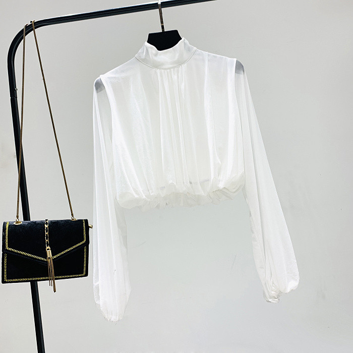 Elegáns női blúz magas pólógallérral és tüll ujjakkal