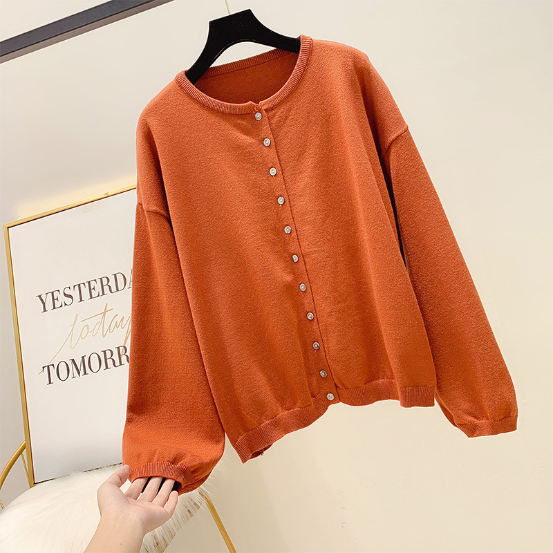 Σύντομη γυναικεία ζακέτα με κουμπιά σε διάφορα χρώματα