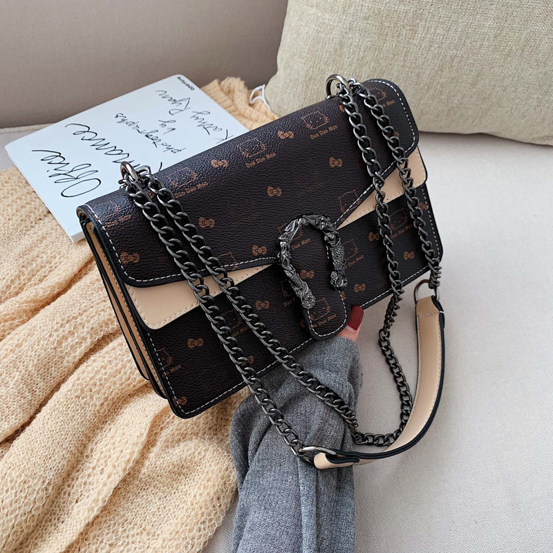 Modern női táska fém elemmel több színben