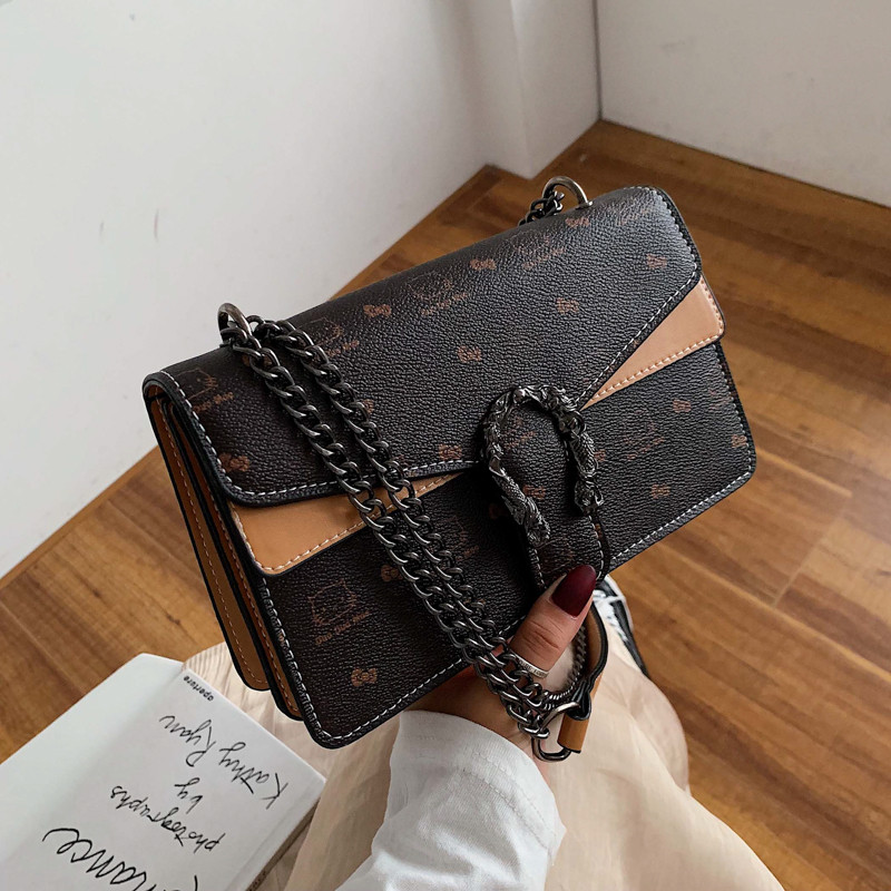 Modern női táska fém elemmel több színben