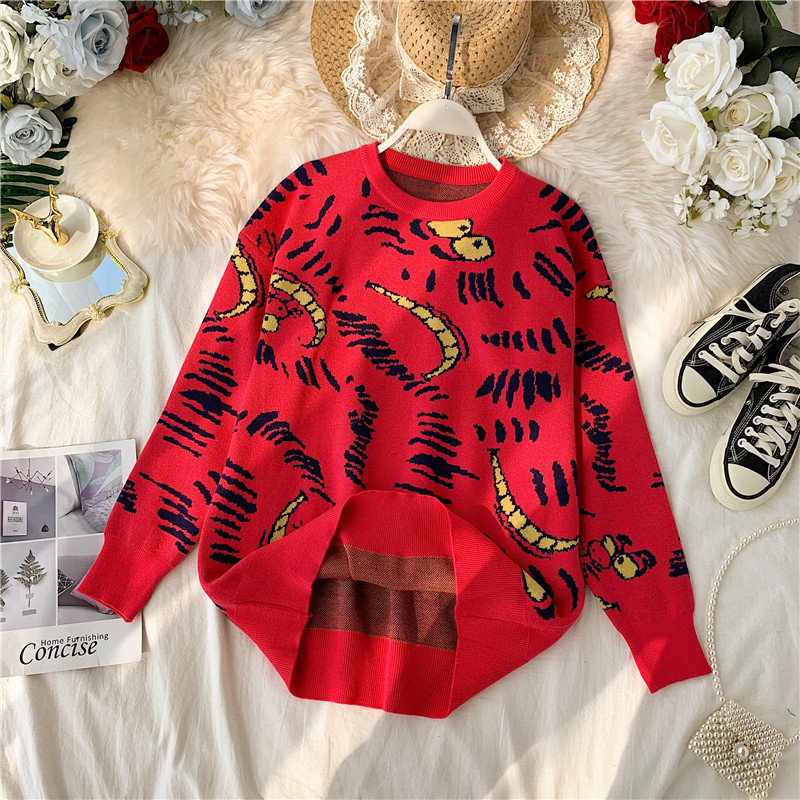 Modern női pulóver színes fekete és piros mintával