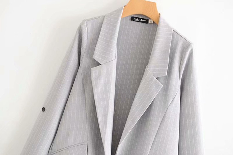 Női csíkos kabát szürke színben, rögzítés nélkül